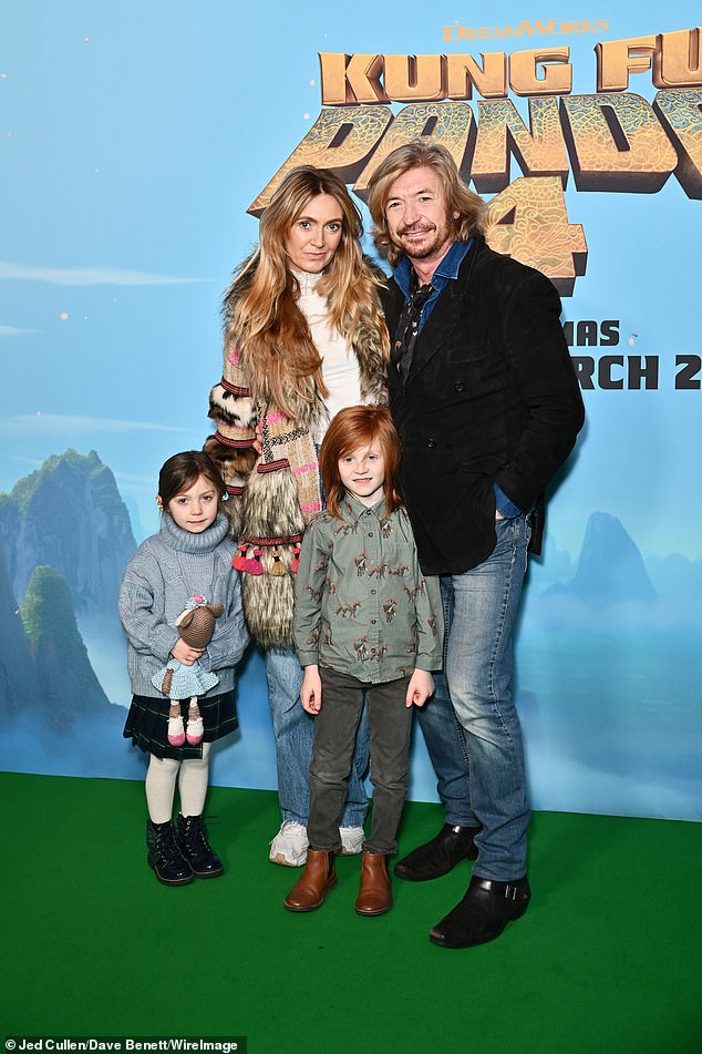 Kelly Simpkin and Nicky Clarke looked cheerful as they posed with their children Cecee and Nico.