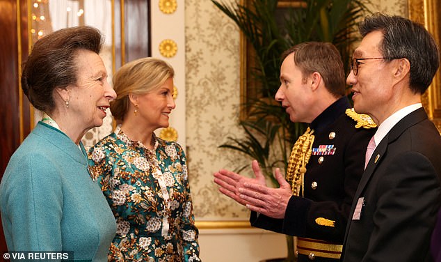 Princess Anne and Sophie speak to Major General Eldon Millar and Yoon Yeocheol, South Korea's ambassador to the UK.