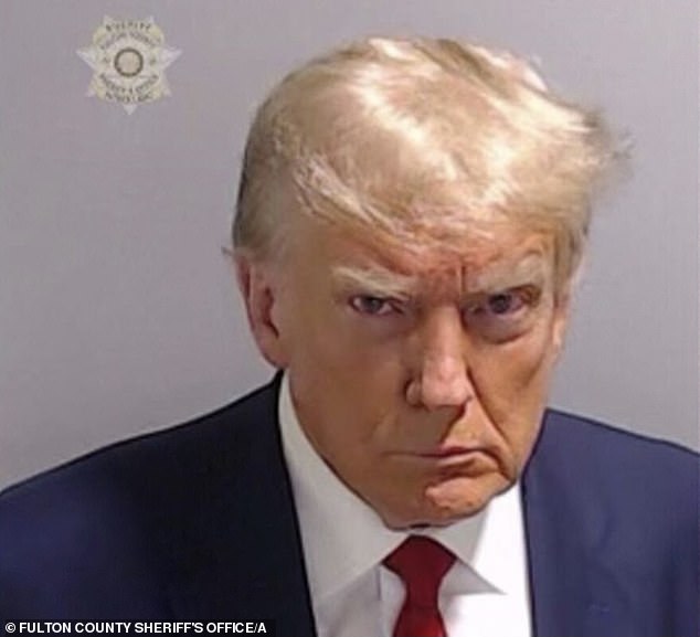 Trump faces four felony indictments, including separate federal and state cases, for his efforts to overturn the 2020 election that he lost to President Joe Biden.  (Pictured: Trump's mugshot for the case)