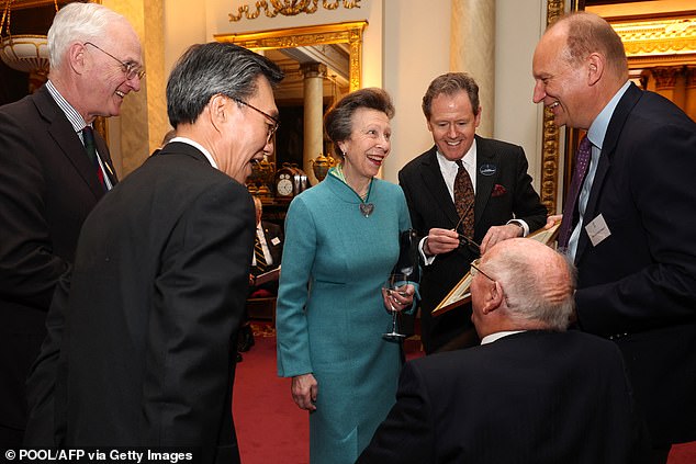 Pictured: Anne and South Korea's ambassador to the UK, Yoon Yeocheol, laugh as they talk to war veterans this week.