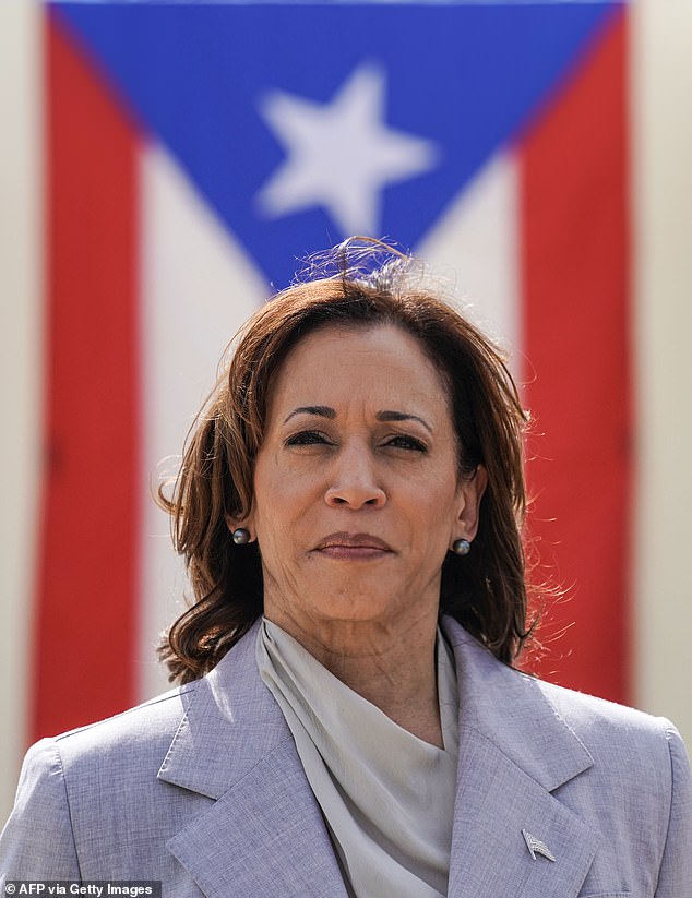 After Kamala Harris (pictured) realized the translation of the lyrics, her face fell.  Here she appears waiting to speak after touring a private home in Canóvanas, Puerto Rico.