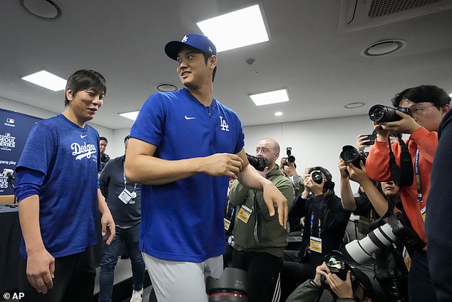 Shohei Ohtani and Ippei Mizzuhara are seen leaving a press conference in Seoul last week.