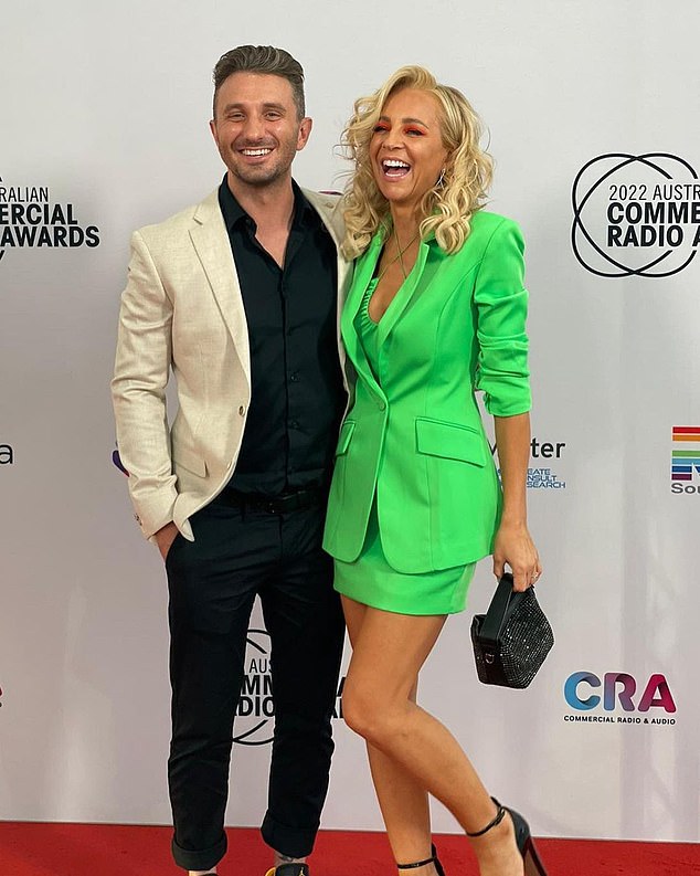 A tongue-in-cheek comment about Carrie Bickmore being the boy's mother was a reference to long-standing rumors that Tommy had been involved in a secret affair with his Hit Network radio co-host.  Both in the photo