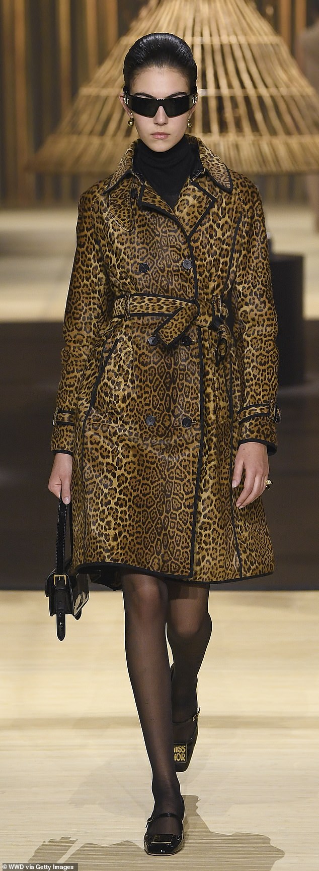 Dior's fall collection shown at Paris Fashion Week included cropped, paneled trench coats.