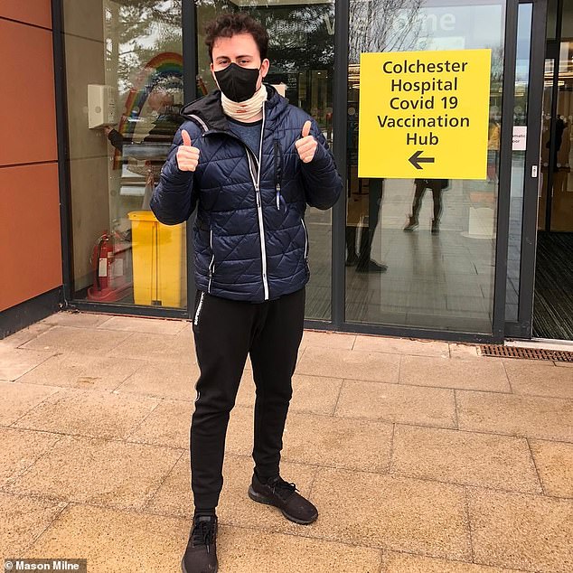 Mason, pictured outside the Covid vaccination center at Colchester Hospital, takes chemotherapy tablets daily and biologic injections every two weeks as part of his treatment for Chron's disease.