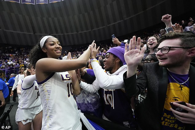 Reese is seen greeting the student body as LSU's victory means they advance to the Sweet 16.