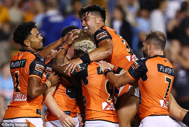 The Wests Tigers have claimed the last two consecutive NRL wooden spoons and were in full celebration after Saturday night's big win.