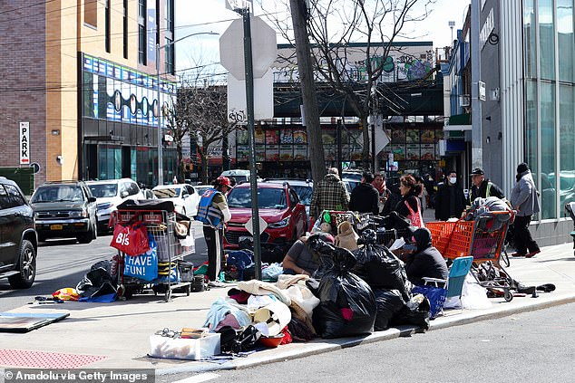 Immigrants who cannot find work and struggle to survive by selling used clothing and other items on the streets of Queens in New York City.