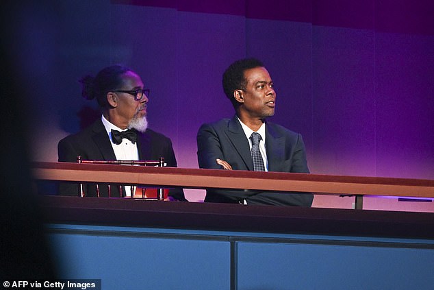 Comedian Chris Rock (right) was among the list of guest appearances at the event honoring Hart. During his onstage presentation, Rock said 'dark days are ahead' if Donald Trump wins in 2024