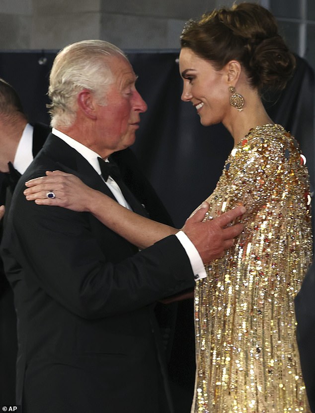Charles and Kate hug at the premiere of 'No Time To Die' in London in September 2021
