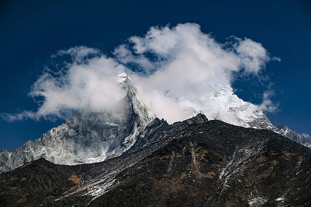 Keen, who has already raised more than £2,300 for Kidney Wales, was adamant about completing the walk, so rejoined the group as soon as he recovered and finished the final steps on horseback (archive image of Mount Everest seen from the town of Tengboche)