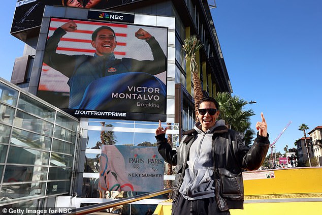 Montalvo poses with his sign on the Sunset Strip during Team USA's Road to Paris bus tour.