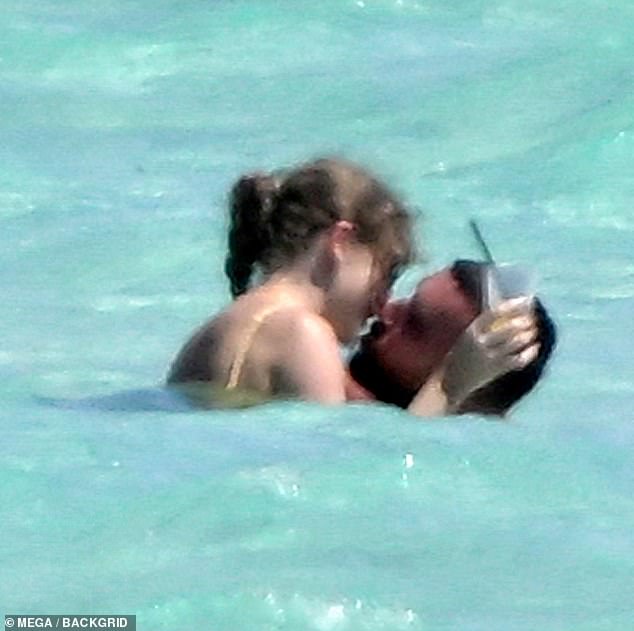 They also couldn't keep their hands (or lips) off each other, in sizzling PDA.