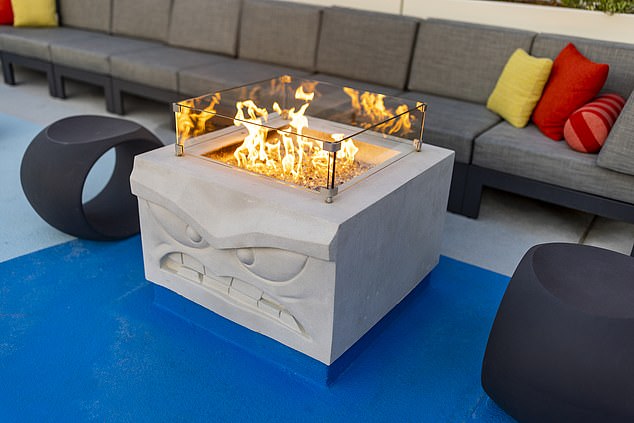 The outdoor seating area features fire pits sculpted to represent Pixar's brash characters. The image above shows fiery anger from the inside out