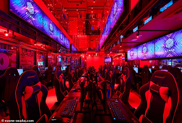 The first two floors (pictured) - often used for tournaments - are lit by red LED lights and large monitors occupy the walls and ceilings.