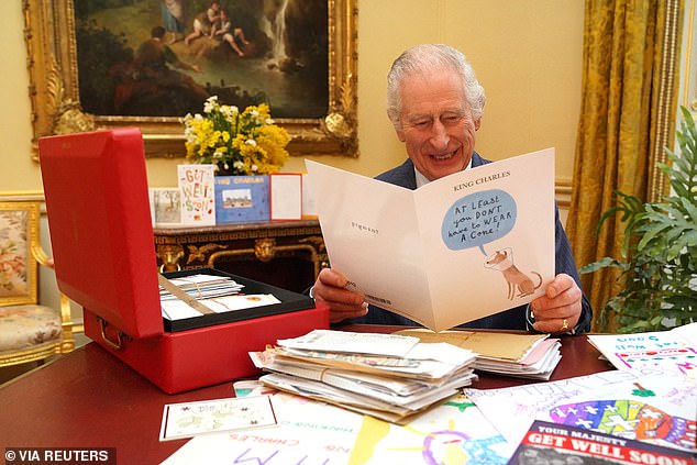 Charles was photographed reading cards and letters sent by well-wishers following his diagnosis.