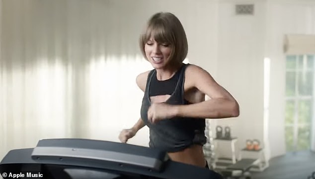 Pictured: Taylor Swift seen singing on a treadmill in her Apple Music ad, which launched in April 2016.