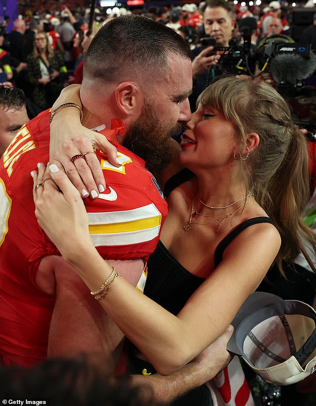 Pictured: Taylor Swift seen hugging Travis Kelce after the Kansas City Chiefs won the Superbowl.