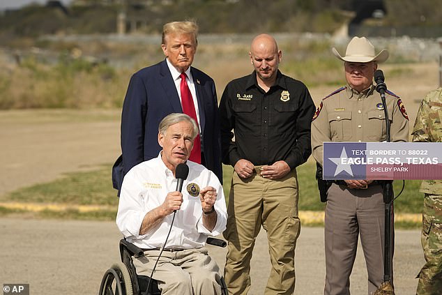 Republican presidential candidate former President Donald Trump listens as Texas Gov. Greg Abbott speaks in Shelby Park during a visit to the U.S.-Mexico border, Thursday, Feb. 29, 2024.