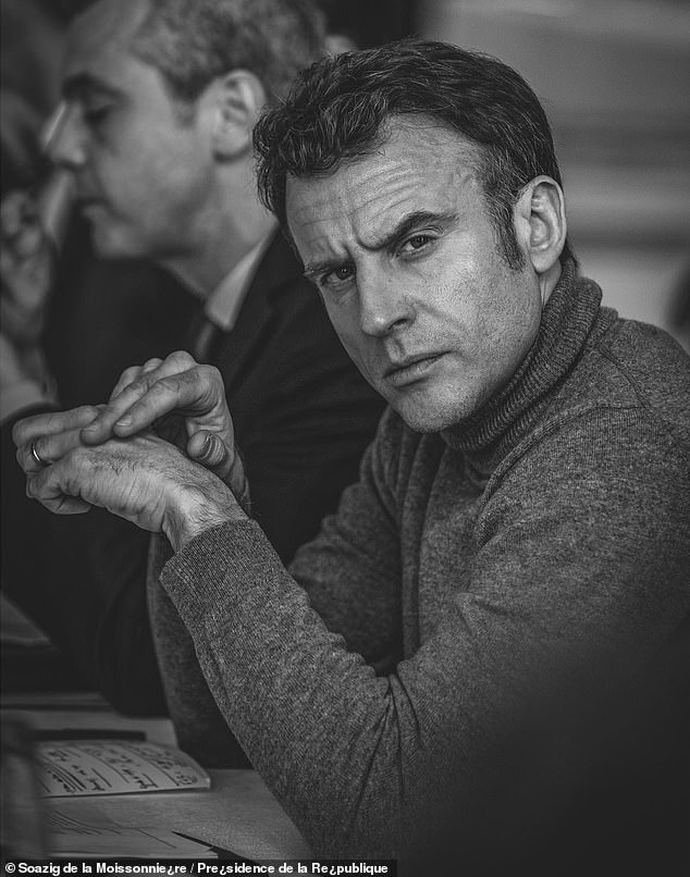Emmanuel Macron appears deep in thought in another black and white artistic photograph
