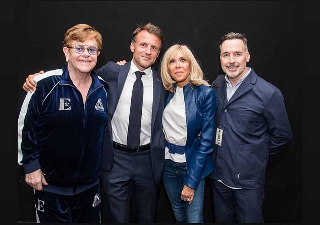 Macron and his wife appear alongside Elton John and David Furnish.