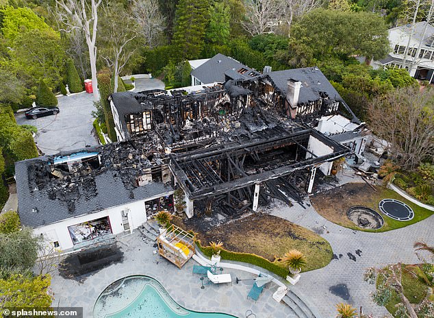 Aerial images show the $7 million property reduced to a pile of rubble after a fire caused by an electrical problem.
