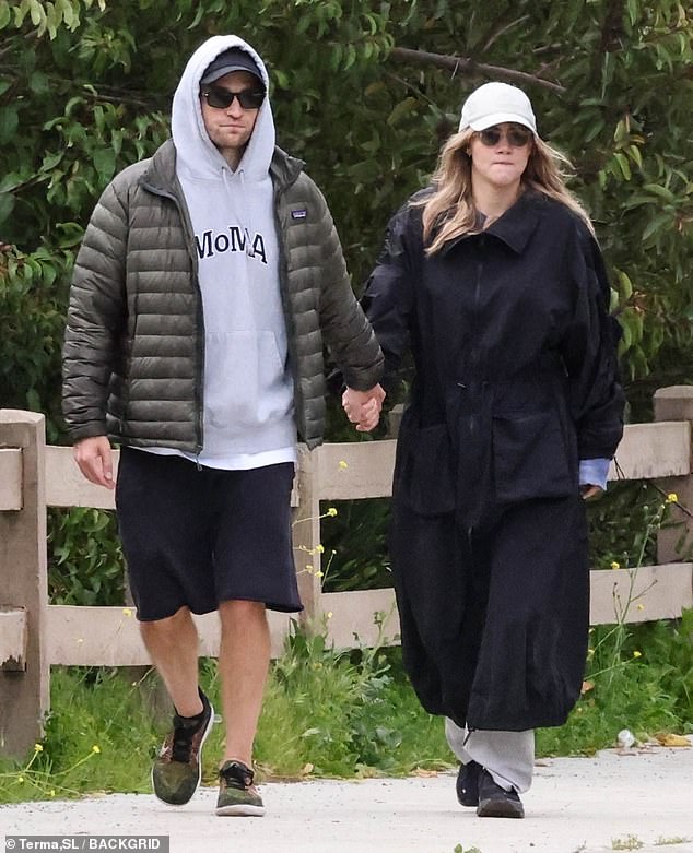 They looked as in love as ever as they held hands while in Los Angeles.