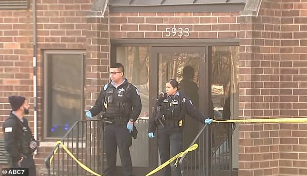Police officers seen outside the family's apartment complex, seen earlier this month, investigating the crime scene.