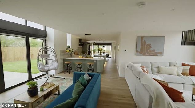 The couple forked out a whopping £500,000 to renovate the Victorian shed into a stunning open plan home for the family of five (pictured: The ground floor of the shed after the renovation, which includes two living areas)