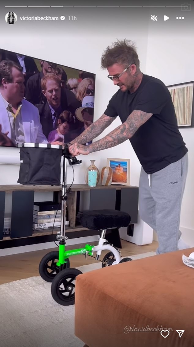 Husband David has a shift powering up the KneeRover mobility device at their family home.