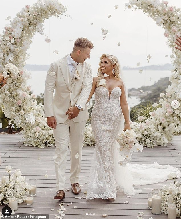 With her husband James after tying the knot in a lavish ceremony in Thailand in February.
