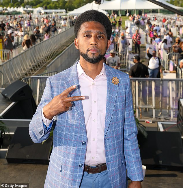 Scott poses for a photo during the 2021 Preakness horse racing festival