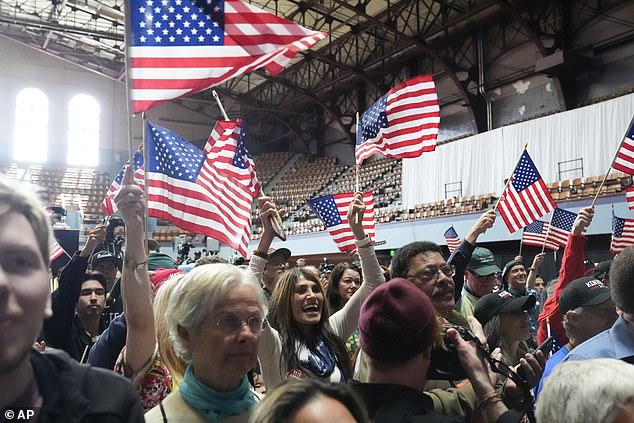 Supporters of independent presidential candidate Robert F. Kennedy Jr. applaud before his announcement as vice president Tuesday morning in Oakland, California.