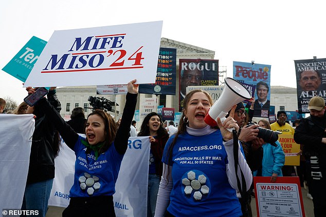 Women point out that abortion is important to them in the upcoming elections with the sign 'Mife Miso '24', which refers to the two-step medical abortion process.  Mifepristone is one of two pills used in the medical abortion process.