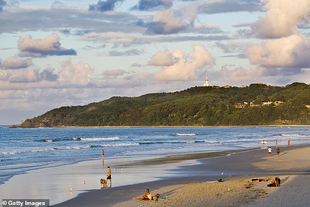 Popular holiday destination Byron Bay in northern New South Wales will receive rain over the long weekend with temperatures reaching just 25C (pictured).