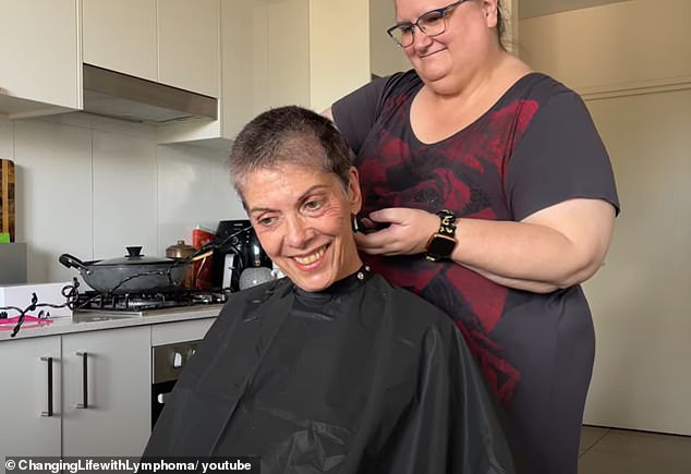Lovegrove is documenting her battle with cancer on her YouTube channel. In one video, she shares the moment her friend shaves her hair (pictured).