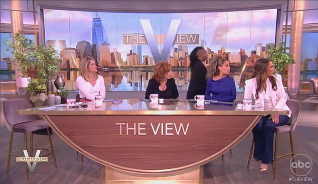 Whoopi began walking to the other side of the studio while her co-hosts looked confused.