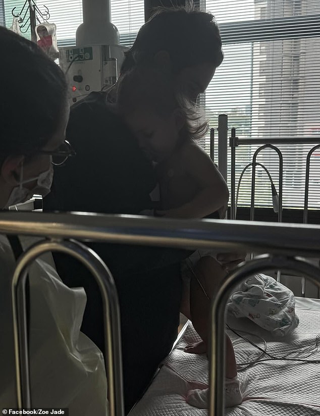 Kealii (pictured with his father) has just three weeks to start his treatment in the United States, but his family is still trying to raise the money.