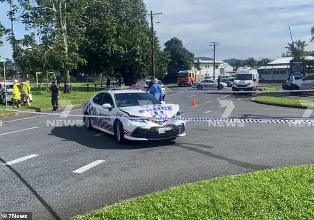 Police shot man after he crashed allegedly stolen police car outside IGA in Woree, Cairns (pictured)