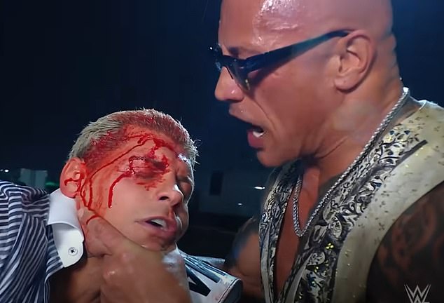 He was involved in a bloody brawl with Cody Rhodes (left) to close Monday's RAW show.