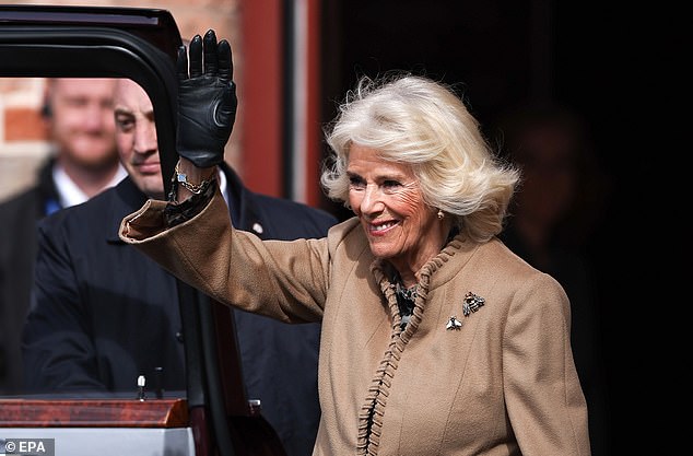 Queen Camilla smiles and waves as she leaves Shrewsbury Flaxmill Maltings today