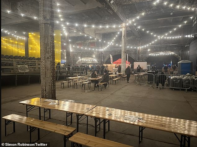 One photo showed a large warehouse space decorated with fairy lights but very few customers