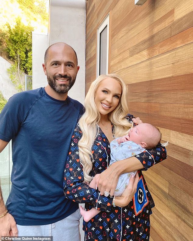 Richard, pictured with Quinn and their son, Christian, has denied his wife's claim that he threw a glass bag at her, as he seeks a temporary restraining order against her.