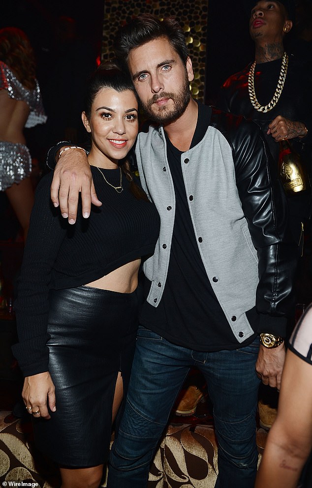 Scott was in a long-term relationship with Kourtney Kardashian from 2006 to 2015 and the former couple shares three children (pictured in October 2013).