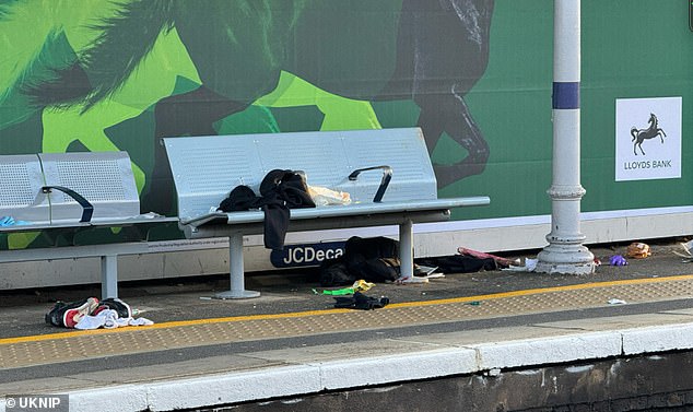 Rubbish is seen at the scene after this afternoon's stabbing, which left a man seriously injured