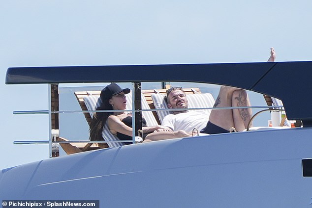 Taking advantage of their extra space, Beckham and his fashion designer wife were seen soaking up the sun as spring temperatures on the Gulf Coast continued to rise on Monday.