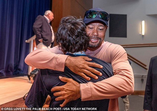 Woods shared a warm hug with his son after reuniting with his ex-partner