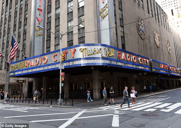 Former Presidents Barack Obama and Bill Clinton will take the stage with President Joe Biden at Radio City Music Hall in New York City (pictured) for a discussion moderated by CBS Late Show host Stephen Colbert.