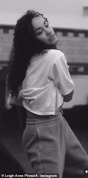 Showing off her natural beauty, Leigh-Anne kept her clip candid and wore a white crop top tucked into her bra.
