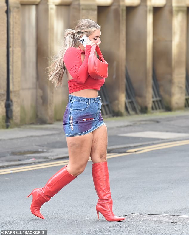 The reality personality, 24, was pictured laughing on the phone when she returned the next morning, after she was seen looking cozy with Adam Maxted at the event.